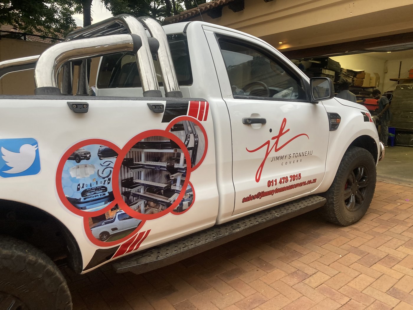 Full commercial activation bakkie wrapped with contact details and corporate graphics